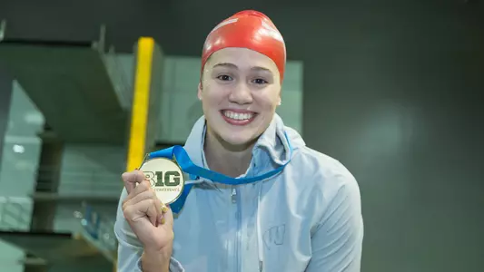 Beata Nelson poses with gold medal