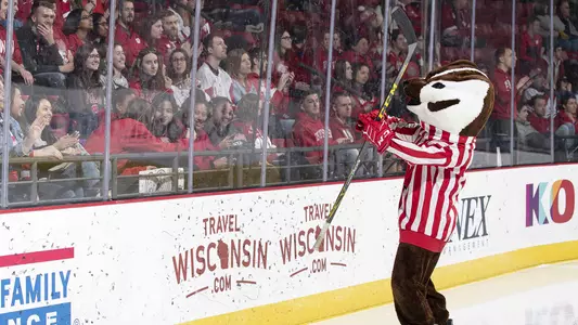 Wisconsin's Bucky Badger cheers with fans during an NCAA college women’s hockey game against the Ohio State Buckeyes, Sunday, February 16, 2020, in Madison, Wis. The Badgers tied the Buckeyes 1-1 and the Badgers won 3 on 3 Overtime. (Photo by David Stluka/Wisconsin Athletic Communications)
