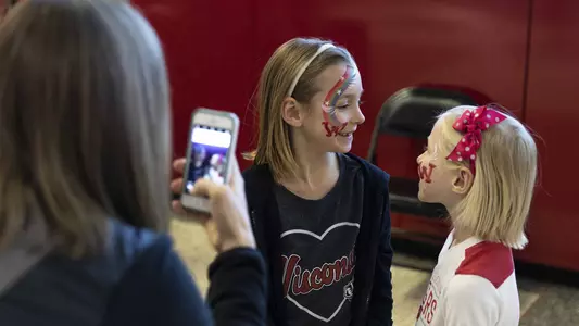 Fans take part in the celebration of National Girls and Women in Sports Day before an NCAA women’s basketball game against Iowa on Sunday January 19, 2020 in Madison, Wisconsin.Photo by Tom Lynn/Wisconsin Athletic Communications