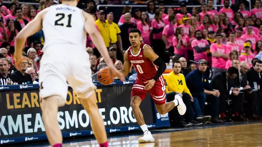 D'Mitrik Trice dribbles the ball up court against Michigan during a Big Ten men's basketball game in Ann Arbor, Michigan. 2020.