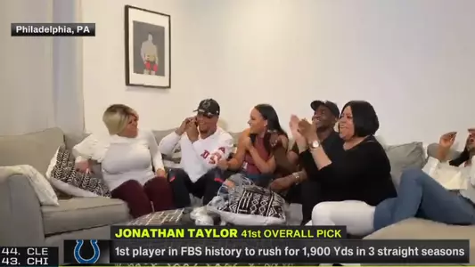 screenshot of ABC broadcast of Jonathan Taylor and family during NFL draft