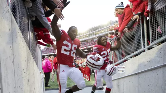 Montee Ball and Melvin GMontee Ball and Melvin Gordon with fans in the Camp Randall Stadium tunnel postgame - Illinois 2012ordon with fans in the Camp Randall Stadium tunnel postgame - Illinois 2012