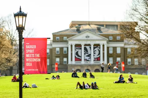 Students enjoy a warm spring day on Bascom Hill at the University of Wisconsin-Madison on April 24, 2019. (Photo by Bryce Richter /UW-Madison)