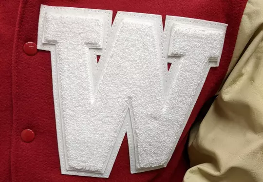 Close-up photo of Wisconsin letterwinners jacket W