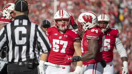 Wisconsin Badgers linebacker Jack Sanborn (57) celebrates with teammate Chris Orr (54) during an NCAA Big Ten Conference college football game against the Michigan State Spartans Saturday, Oct. 12, 2019, in Madison, Wis. The Badgers won 38-0. (Photo by David Stluka/Wisconsin Athletic Communications)
