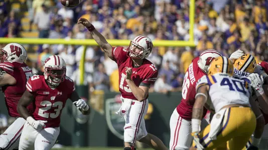Wisconsin Badgers quarterback Bart Houston (13) throws the ball during an NCAA college football game against the LSU Tigers Saturday, September 3, 2016, in Green Bay, Wis. The Badgers beat the Tigers 16-14. (Photo by David Stluka)