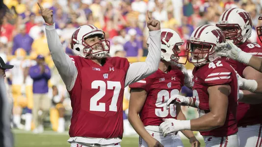 Wisconsin Badgers kicker Rafael Gaglianone (27) celebrates a field goal during an NCAA college football game against the LSU Tigers Saturday, September 3, 2016, in Green Bay, Wis. The Badgers beat the Tigers 16-14. (Photo by David Stluka)