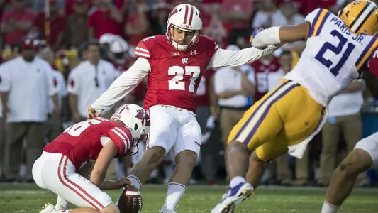 Wisconsin Badgers kicker Rafael Gaglianone (27) kicks the winning field goal during an NCAA college football game against the LSU Tigers Saturday, September 3, 2016, in Green Bay, Wis. The Badgers beat the Tigers 16-14. (Photo by David Stluka)
