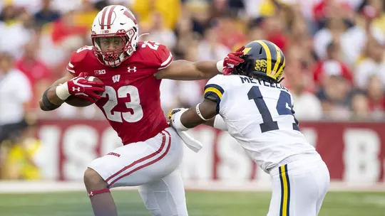 Wisconsin Badgers running back Jonathan Taylor (23) carries the ball during an NCAA Big Ten Conference college football game against the Michigan Wolverines Saturday, Sept. 21, 2019, in Madison, Wis. The Badgers won 35-14. (Photo by David Stluka/Wisconsin Athletic Communications)