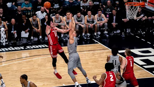 Micah Potter shoots during a game at Penn State