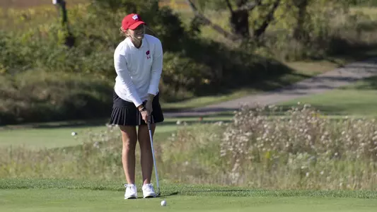 Bobbi Stricker putts at University Ridge
