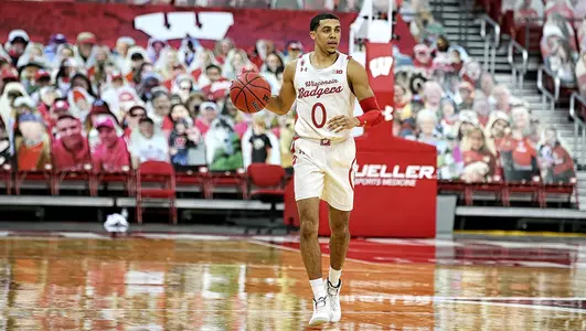 D'Mitrik Trice dribbles during a game against Northwestern