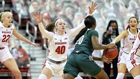 Tara Stauffacher plays defense against MSU.