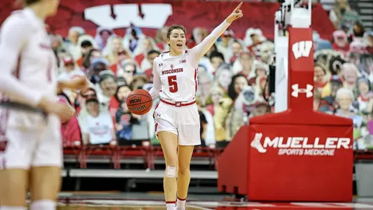 Julie Pospisilova directs the Badger offense.
