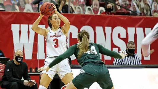 Brooke Schramek looks to pass the ball
