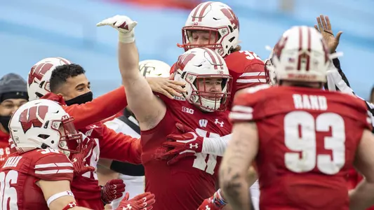 Wisconsin Badgers linebacker Noah Burks (41) celebrates an interception with teammates return during an NCAA college football game at the Duke’s Mayo Bowl against the Wake Forest Demon Deacons Wednesday, Dec. 30, 2020, in Charlotte, NC. The Badgers won 42-28. (Photo by David Stluka/Wisconsin Athletic Communications)