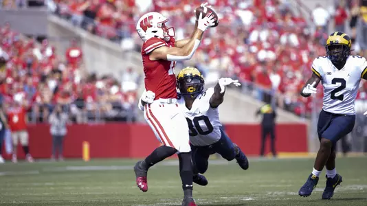 Wisconsin Badgers Chimere Dike catches a touchdown pass during an NCAA college football game against the Michigan Wolverines, Saturday, Oct. 2, 2021, in Madison, Wis. (Photo by David Stluka/Wisconsin Athletic Communications)