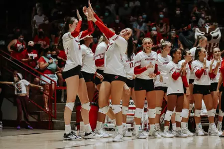 Grace Loberg and Dana Rettke High-Five versus