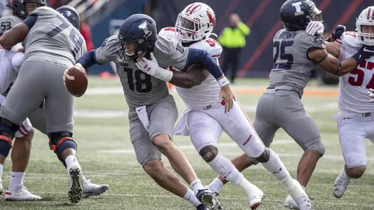 Wisconsin Badgers linebacker Chris Orr (54) sacks Illinois Fighting Illini quarterback Brando Peters (18) during an NCAA Big Ten Conference college football game Saturday, Oct. 19, 2019, in Champaign, Ill. The Fighting Illini won 24-23. (Photo by David Stluka/Wisconsin Athletic Communications)