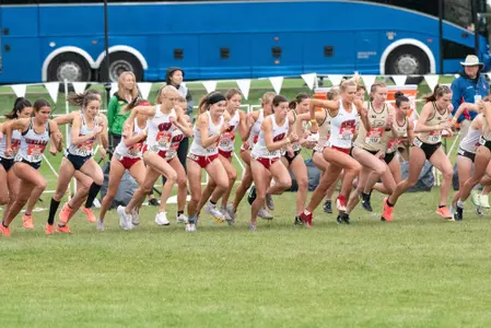The women's cross country team at the start of a race