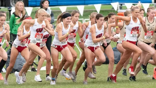 The women's cross country team at the start of a race