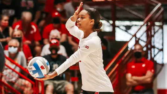 Sydney Reed serves up the ball.