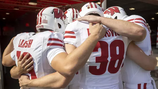 Wisconsin Badgers warmup prior to an NCAA college football game against the Illinois Fighting Illini, Saturday, Oct. 9, 2021, in Champaign, Ill. (Photo by David Stluka/Wisconsin Athletic Communications)