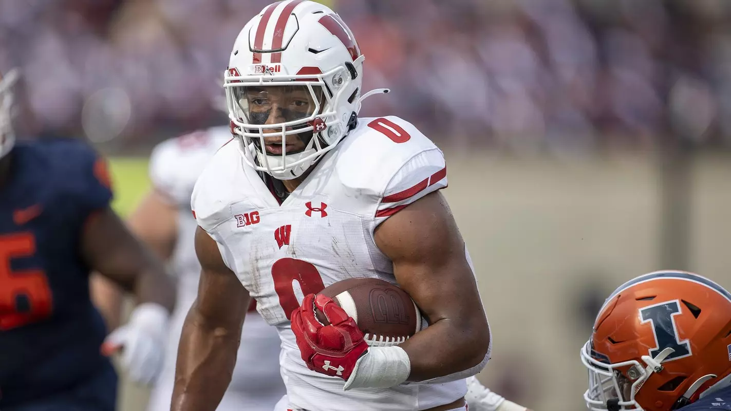 Wisconsin Badgers running back Braelon Allen (0) carries the ball during a NCAA college football game against the Illinois Fighting Illini, Saturday, Oct. 9, 2021, in Champaign, Ill. (Photo by David Stluka/Wisconsin Athletic Communications)
