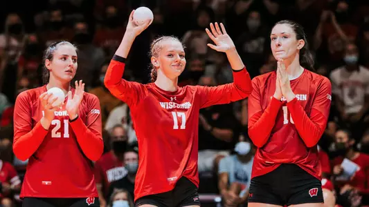 Lauren Jardine waves to the crowd during starting lineups