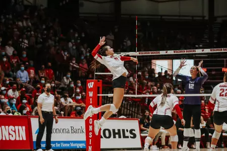 Grace Loberg goes up for a kill vs.