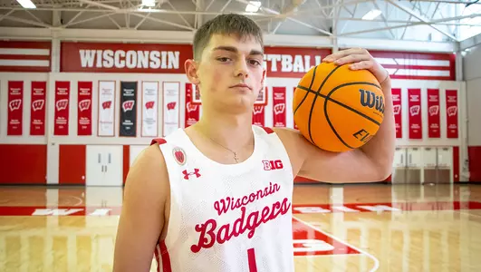 Connor Essegian poses for a photo during an official recruiting visit
