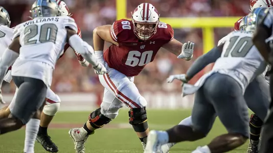 Wisconsin Badgers offensive lineman Logan Bruss (50) during an NCAA college football game against the Eastern Michigan Eagles Saturday, Sept. 11, 2021, in Madison, Wis. The Badgers won 34-7. (Photo by David Stluka/Wisconsin Athletic Communications)