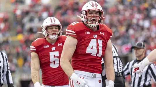 Wisconsin Badgers linebacker Noah Burks (41) celebrates a turnover during an NCAA college football game against the Iowa Hawkeyes, Saturday, Oct. 30, 2021, in Madison, Wis. The Badgers won 27-7. (Photo by David Stluka/Wisconsin Athletic Communications)