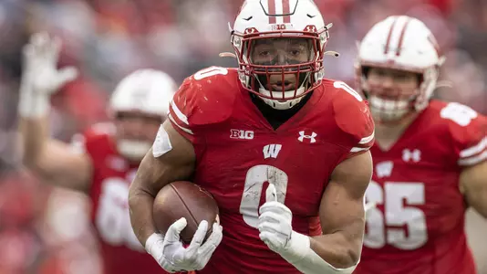 Wisconsin Badgers running back Braelon Allen (0) scores a rushing touchdown during an NCAA college football game against the Northwestern Wildcats, Saturday, Nov. 13, 2021, in Madison, Wis. The Badgers won 35-7. (Photo by David Stluka/Wisconsin Athletic Communications)