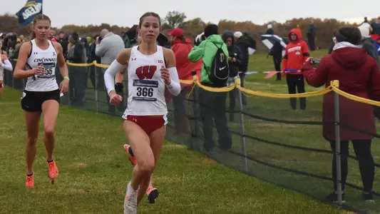 Samantha Stieve crosses the finish line at regionals