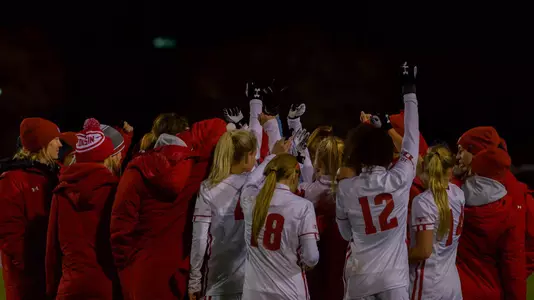 Badgers huddle after their 2-1 win over Butler