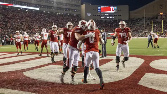 Wisconsin Badgers running back Braelon Allen (0) celebrates a touchdown with teammates during an NCAA college football game against the Nebraska Cornhuskers, Saturday, Nov. 20, 2021, in Madison, Wis. The Badgers won 35-28. (Photo by David Stluka/Wisconsin Athletic Communications)
