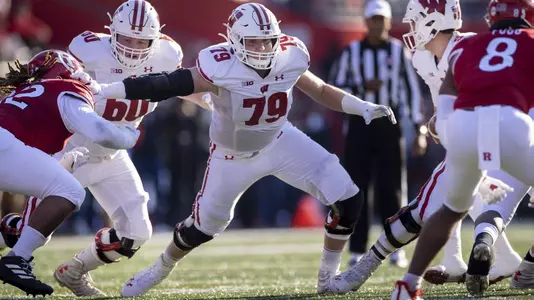 Wisconsin Badgers offensive lineman Jack Nelson (79) blocks during an NCAA college football game against the Rutgers Scarlet Knights, Saturday, Nov. 6, 2021, in Piscataway, N.J. The Badgers won 52-3. (Photo by David Stluka/Wisconsin Athletic Communications)