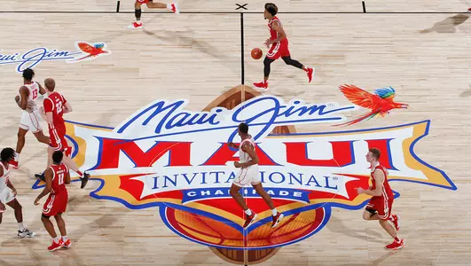 Chucky Hepburn dribbles the ball during a game at the 2021 Maui Jim Maui Invitational