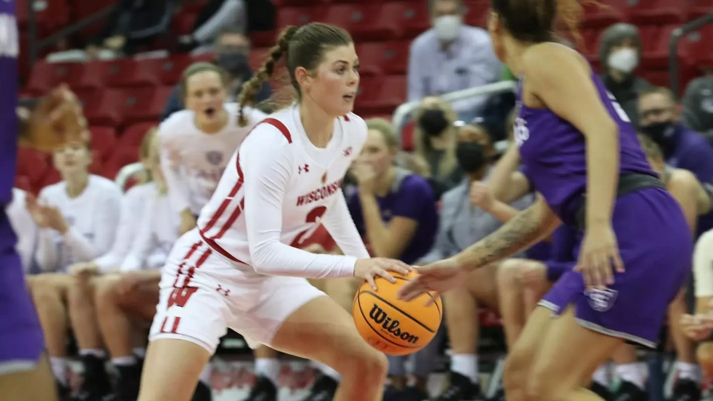 Katie Nelson drives around a NJIT defender.