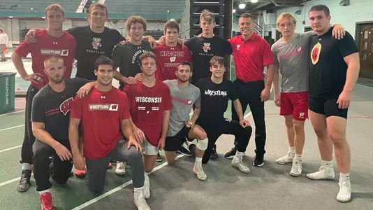 12 Wisconsin wrestlers at the 2021 Michigan State Open with Associate Head Coach Jon Reader - Cody Anderson, Kyle Burwick, Graham Calhoun, Peter Christensen, Tyler Dow, Brooks Empey, Aidan Medora, Kevin Meicher, Gavin Model, Drew Scharenbrock, Andrew Sanders, Jack Severin