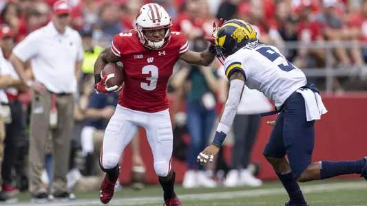 Wisconsin Badgers wide receiver Kendric Pryor (3) carries the ball during an NCAA college football game against the Michigan Wolverines, Saturday, Oct. 2, 2021, in Madison, Wis. The Wolverines won 38-17. (Photo by David Stluka/Wisconsin Athletic Communications)