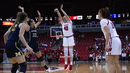 Tara Stauffacher shoots a three.