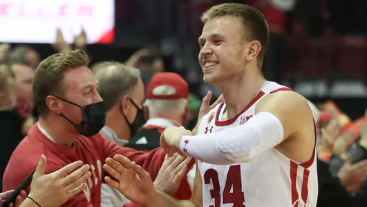 Davison high fives fans after a win over Indiana