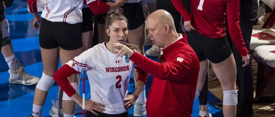 Wisconsin Badgers' head coach Kelly Sheffield talks with Sydney Hilley, Wisconsin Badgers' setter Sydney Hilley (2) during an NCAA volleyball match against Minnesota on Saturday December 11, 2021 in Madison, WI.Photo by Tom Lynn/Wisconsin Athletic Communications