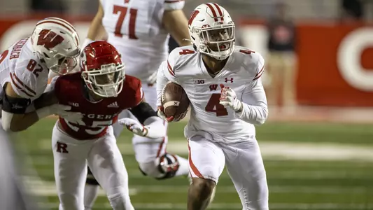 Wisconsin Badgers wide receiver Markus Allen (4) carries the ball during an NCAA college football game against the Rutgers Scarlet Knights, Saturday, Nov. 6, 2021, in Piscataway, N.J. The Badgers won 52-3. (Photo by David Stluka/Wisconsin Athletic Communications)
