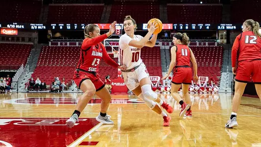 Halle Douglass drives to the hoop against an ISU defender.