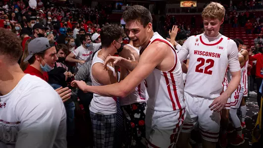 Vogt celebrates with fans after a win over Indiana