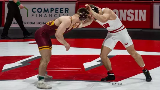 Jared Krattiger (174 pounds) earns a 5-3 decision victory over Minnesota's Jake Allar on Friday, Feb. 12, 2021 at the UW Field House in Madison, Wis. Photo by Stacy Schiesl.