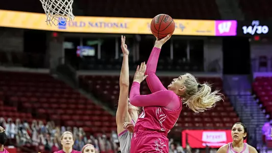 Sara Stapleton shoots the basketball over an Ohio State defender.